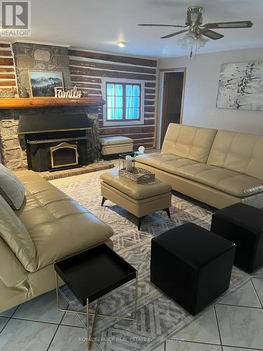 108 Coldstream Road, Kawartha Lakes, ON - Indoor Photo Showing Living Room With Fireplace