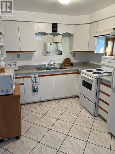 108 Coldstream Road, Kawartha Lakes, ON - Indoor Photo Showing Kitchen With Double Sink