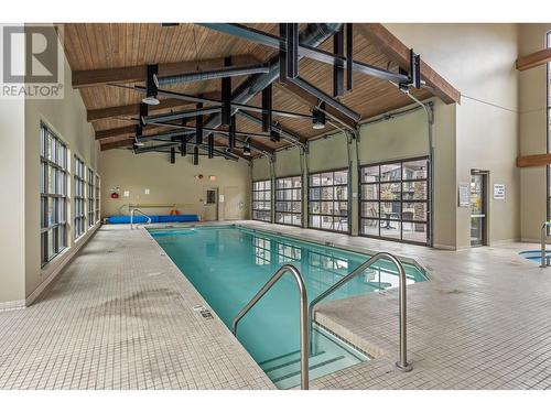 580 Sarsons Road Unit# 216, Kelowna, BC - Indoor Photo Showing Other Room With In Ground Pool