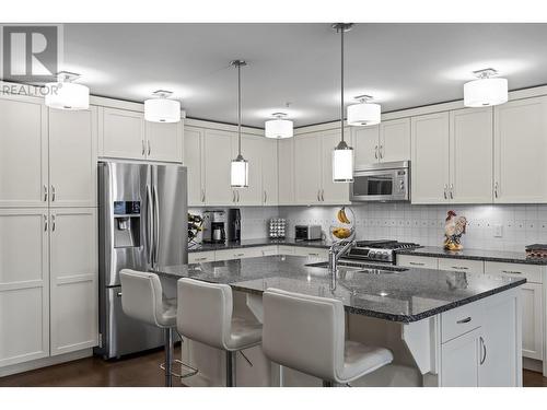 580 Sarsons Road Unit# 216, Kelowna, BC - Indoor Photo Showing Kitchen With Stainless Steel Kitchen With Upgraded Kitchen