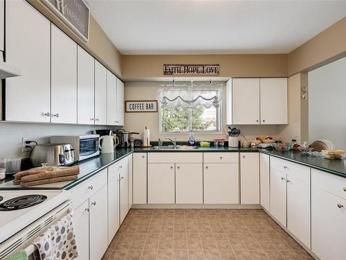 2068 Townsend Rd, Sooke, BC - Indoor Photo Showing Kitchen With Double Sink