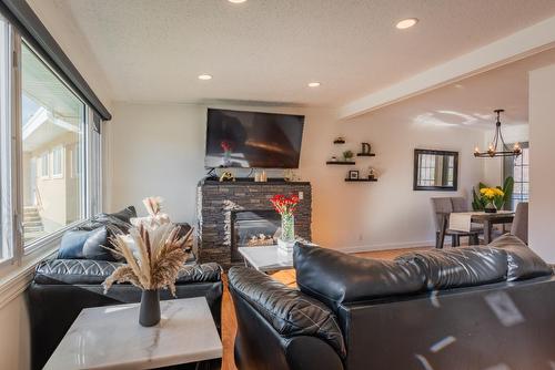 3939 Woodland Drive, Trail, BC - Indoor Photo Showing Living Room With Fireplace
