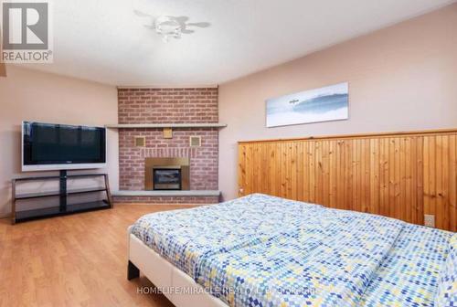51 Beck Blvd, Penetanguishene, ON - Indoor Photo Showing Bedroom With Fireplace