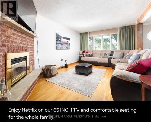 51 Beck Blvd, Penetanguishene, ON - Indoor Photo Showing Living Room With Fireplace
