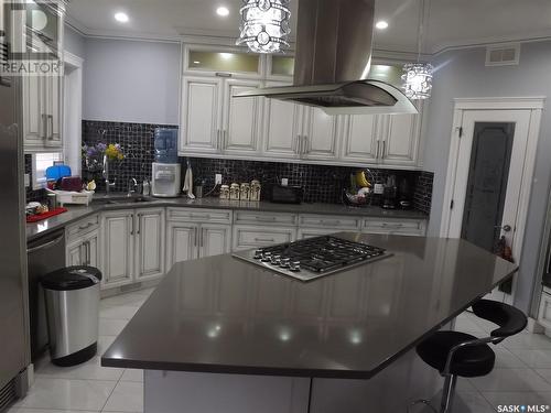 116 Emerald Ridge E, White City, SK - Indoor Photo Showing Kitchen With Upgraded Kitchen