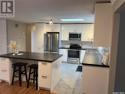 202 Brookdale Place, Wynyard, SK - Indoor Photo Showing Kitchen With Double Sink