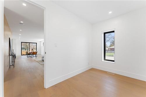 View from corner office to living area. Door for privacy. - 5427 Anthony Place, Burlington, ON - Indoor Photo Showing Other Room