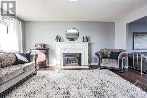 75 Wilson Street W, Perth, ON - Indoor Photo Showing Living Room With Fireplace
