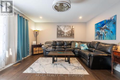 18 Martin St, Springwater, ON - Indoor Photo Showing Living Room With Fireplace