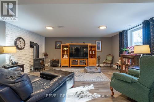 18 Martin Street, Springwater, ON - Indoor Photo Showing Living Room With Fireplace