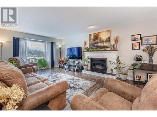 27 Preston Crescent, Enderby, BC - Indoor Photo Showing Living Room With Fireplace