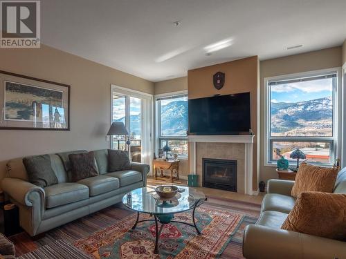 3388 Skaha Lake Road Unit# 903, Penticton, BC - Indoor Photo Showing Living Room With Fireplace