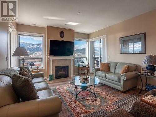 3388 Skaha Lake Road Unit# 903, Penticton, BC - Indoor Photo Showing Living Room With Fireplace