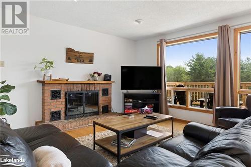 1096 Sandwood Road, Utterson, ON - Indoor Photo Showing Living Room With Fireplace