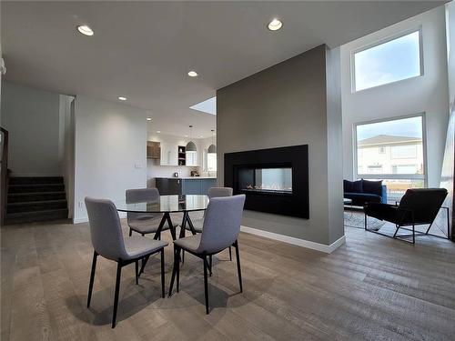 412 Cherrywood Road, Winnipeg, MB - Indoor Photo Showing Dining Room With Fireplace