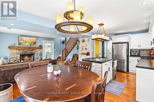 130 Wodehouse Crt, Grey Highlands, ON - Indoor Photo Showing Dining Room With Fireplace
