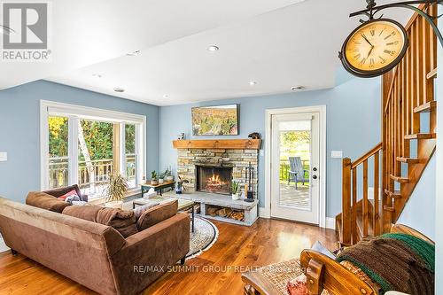 130 Wodehouse Court, Grey Highlands, ON - Indoor Photo Showing Living Room With Fireplace