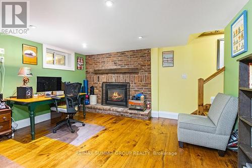 130 Wodehouse Court, Grey Highlands, ON - Indoor Photo Showing Other Room With Fireplace