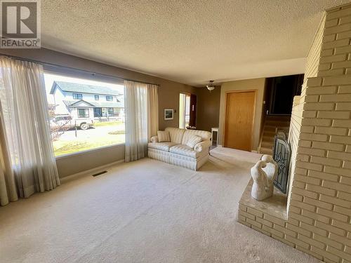 1821 Aspen Drive, Dawson Creek, BC - Indoor With Fireplace