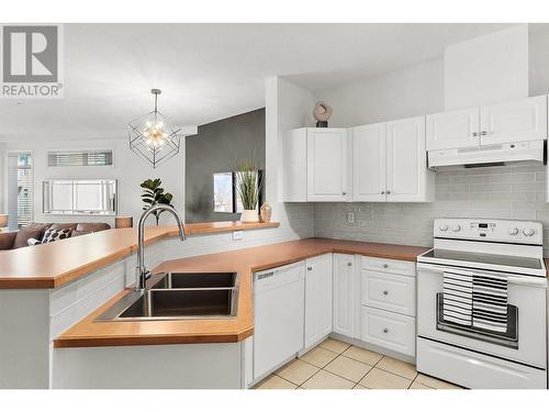 1088 Sunset Drive Unit# 535, Kelowna, BC - Indoor Photo Showing Kitchen With Double Sink
