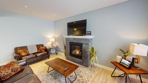 240 Shadow Mountain Boulevard, Cranbrook, BC - Indoor Photo Showing Living Room With Fireplace
