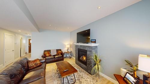 240 Shadow Mountain Boulevard, Cranbrook, BC - Indoor Photo Showing Living Room With Fireplace