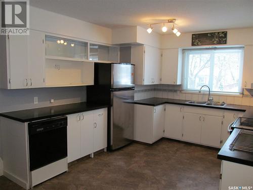 403 1St Street W, Shaunavon, SK - Indoor Photo Showing Kitchen With Double Sink