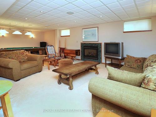 4229 Capilano Crt, Mississauga, ON - Indoor Photo Showing Basement With Fireplace