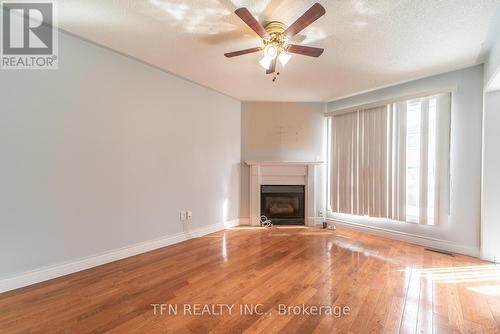 65 Cedarwood Cres, Brampton, ON - Indoor Photo Showing Living Room With Fireplace