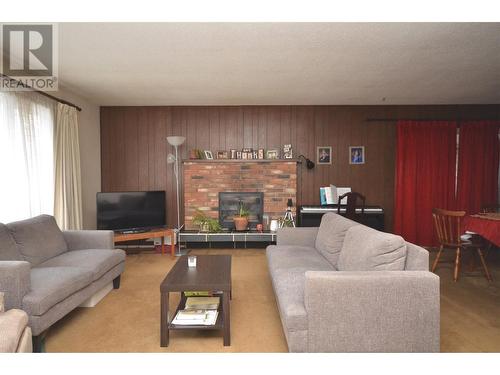 3900 13 Street, Vernon, BC - Indoor Photo Showing Living Room With Fireplace