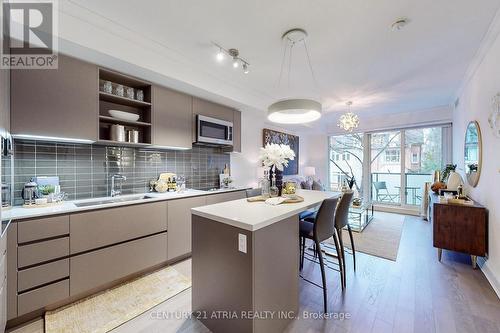 #305 -128 Pears Ave N, Toronto, ON - Indoor Photo Showing Kitchen With Upgraded Kitchen