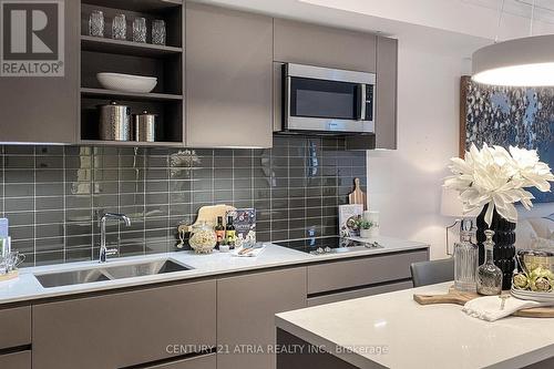 #305 -128 Pears Ave N, Toronto, ON - Indoor Photo Showing Kitchen With Double Sink