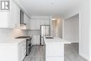 32 Nicort Rd, Wasaga Beach, ON  - Indoor Photo Showing Kitchen With Upgraded Kitchen 