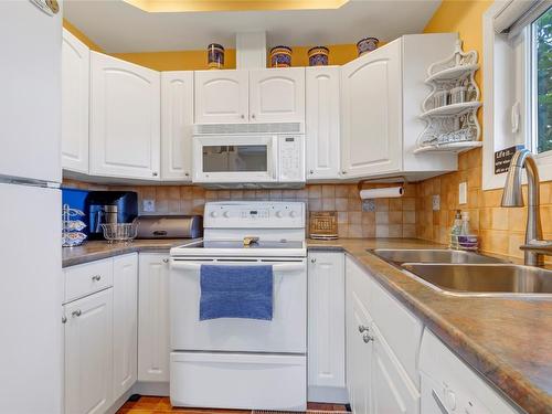 8337 Okanagan Landing Road, Vernon, BC - Indoor Photo Showing Kitchen With Double Sink