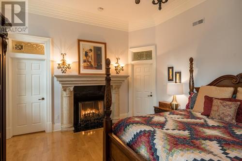 64 Queens Road, St. John'S, NL - Indoor Photo Showing Bedroom With Fireplace