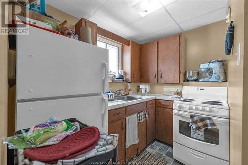 217 Monteith, Fredericton, NB - Indoor Photo Showing Kitchen With Double Sink
