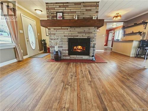 29468 Route 134, Point La Nim, NB - Indoor Photo Showing Living Room With Fireplace