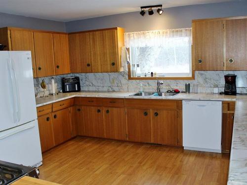 812 Little Street, Rainy River, ON - Indoor Photo Showing Kitchen With Double Sink
