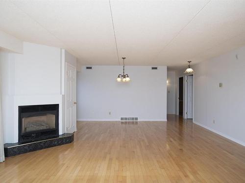 605 145 Fanshaw Street, Thunder Bay, ON - Indoor Photo Showing Living Room With Fireplace