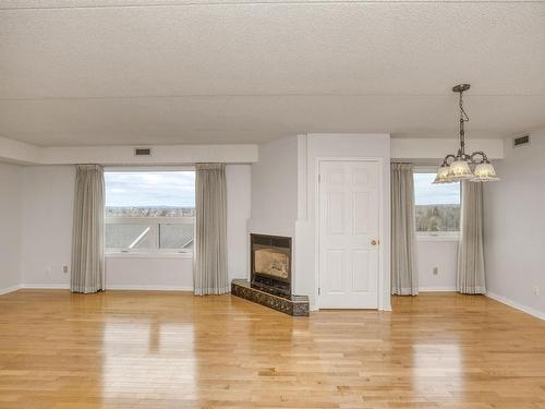 605 145 Fanshaw Street, Thunder Bay, ON - Indoor Photo Showing Other Room With Fireplace