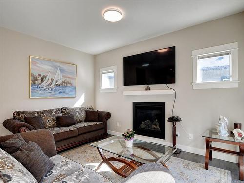 2355 Lund Rd, View Royal, BC - Indoor Photo Showing Living Room With Fireplace