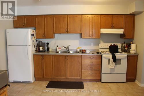 104 - 209A Sutherland Crescent, Cobourg, ON - Indoor Photo Showing Kitchen With Double Sink