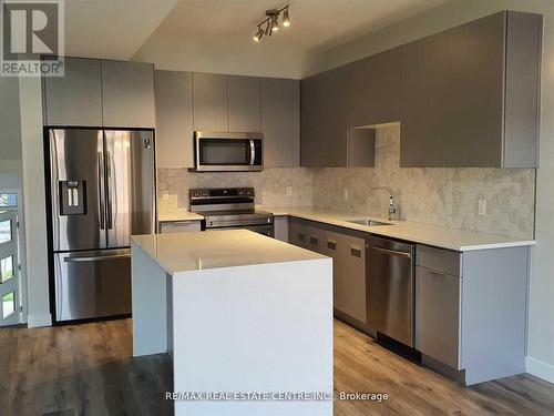 #93 -3380 Singleton Ave, London, ON - Indoor Photo Showing Kitchen With Stainless Steel Kitchen With Upgraded Kitchen