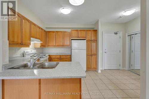 #319 -9519 Keele St, Vaughan, ON - Indoor Photo Showing Kitchen With Double Sink