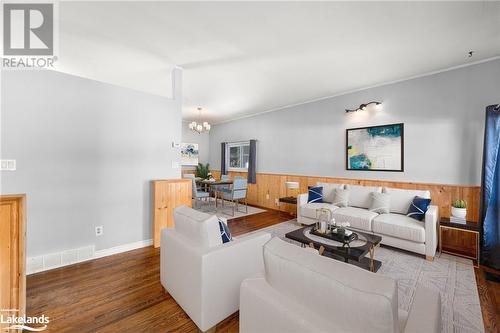 This photo is virtually staged - 37 Mckay Street, Minden, ON - Indoor Photo Showing Living Room