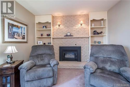 13 Crestline Road, Rothesay, NB - Indoor Photo Showing Living Room With Fireplace