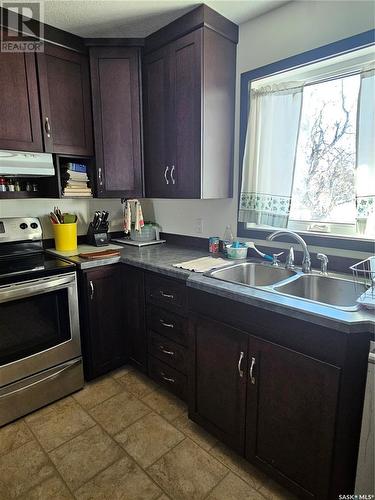 1 Park Boulevard, Melville, SK - Indoor Photo Showing Kitchen With Double Sink