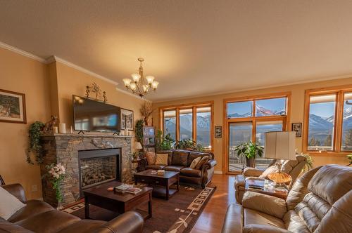 420 Ottoson Road, Golden, BC - Indoor Photo Showing Living Room With Fireplace