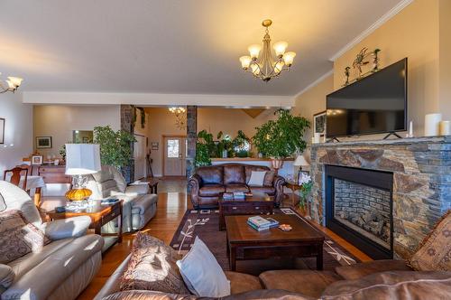 420 Ottoson Road, Golden, BC - Indoor Photo Showing Living Room With Fireplace