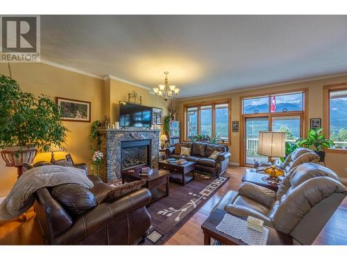 420 Ottoson Road, Golden, BC - Indoor Photo Showing Living Room With Fireplace